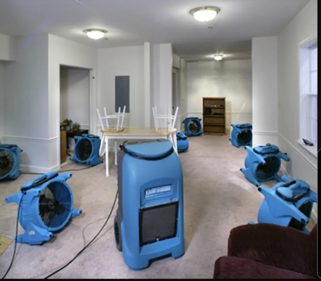 Air movers and dehumidifier setup for Water Damage Restoration in Westerly